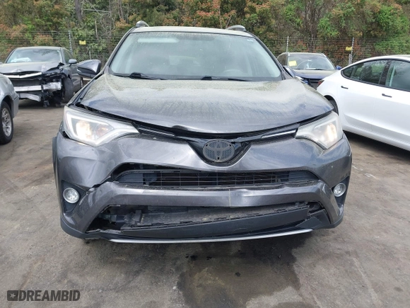 2016 Toyota RAV4 XLE with VIN 2T3WFREV8GW288227, listed as a IAAI auction lot 41931154 with 177,763 mi miles. Bid and sale history available at carsss.com. Image 12.