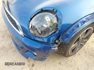 2014 MINI Coupe S z VIN WMWSX3C53ET772993, wystawiony jako IAAI lot #42266901 z przebiegiem 139 678 mil mil oraz . Historia ofert i sprzedaży dostępna na DreamBid. Obrazek 6.