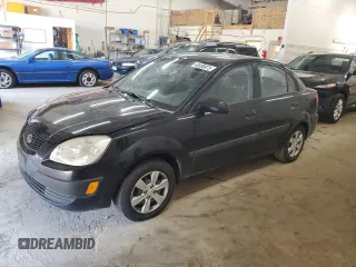 2009 Kia Rio LX with VIN KNADE223096583182, listed as a Copart auction lot 49058975 with 197,395 mi miles and Salvage Title. Bid and sale history available at carsss.com. Image 1.