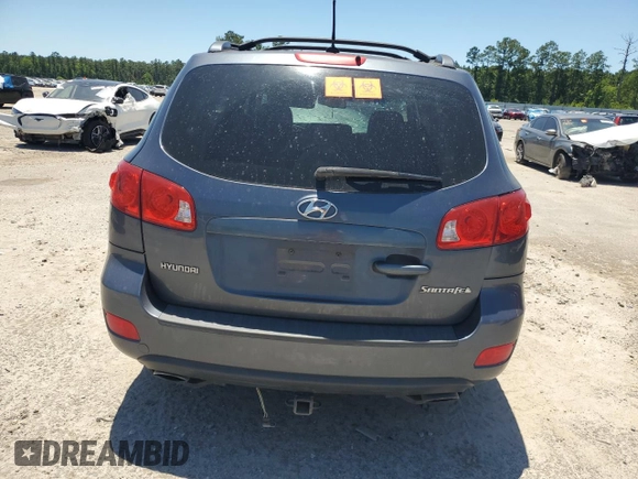 2009 Hyundai Santa Fe SE z VIN 5NMSH13E59H307871, wystawiony jako Copart lot #58072265 z przebiegiem Nie podano mil oraz Szkoda całkowita • Salvage title. Historia ofert i sprzedaży dostępna na DreamBid. Obrazek 6.