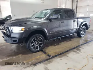 2019 Ram 1500 Laramie with VIN 1C6SRFJTXKN820464, listed as a Copart auction lot 58301485 with 103,135 mi miles and Salvage title. Bid and sale history available at DreamBid. Image 1.