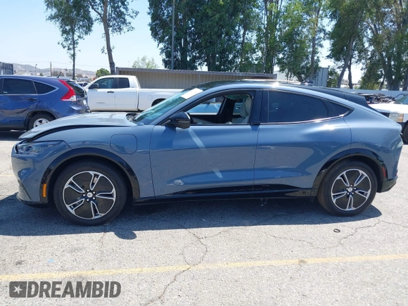 2023 Ford Mustang Mach-E Premium z VIN 3FMTK3R47PMA60861, wystawiony jako IAAI lot #42311615 z przebiegiem 27 469 mil mil oraz . Historia ofert i sprzedaży dostępna na DreamBid. Obrazek 14.