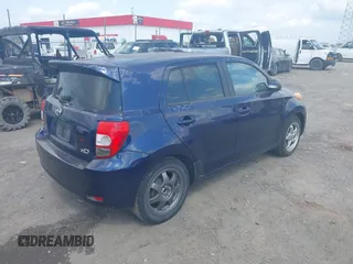 2008 Scion xD with VIN JTKKU10448J004492, listed as a IAAI auction lot 42071070 with 198,787 mi miles. Bid and sale history available at carsss.com. Image 4.