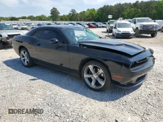2016 Dodge Challenger SXT with VIN 2C3CDZAG0GH326067, listed as a Copart auction lot 53396145 with 144,727 mi miles and Salvage title. Bid and sale history available at DreamBid. Image 4.