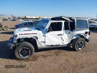 2019 Jeep Wrangler Unlimited Rubicon with VIN 1C4HJXFN7KW505383, listed as a IAAI auction lot 41220907 with 53,578 mi miles and . Bid and sale history available at DreamBid. Image 14.