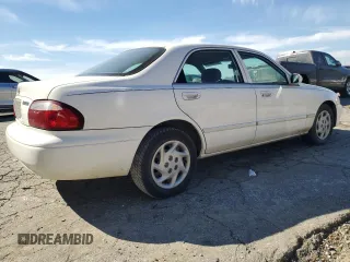 2001 Mazda 626 LX with VIN 1YVGF22C815240640, listed as a Copart auction lot 47609315 with 0 mi miles and Salvage Title. Bid and sale history available at carsss.com. Image 3.