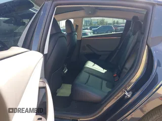 2024 Tesla Model 3 with VIN 5YJ3E1EA9RF849936, listed as a IAAI auction lot 41707656 with 18,749 mi miles and . Bid and sale history available at DreamBid. Image 8.