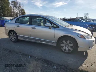 2010 Honda Civic LX with VIN 2HGFA1F57AH327476, listed as a Copart auction lot 45473805 with 202,052 mi miles and Salvage Title. Bid and sale history available at DreamBid. Image 4.