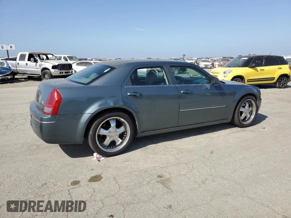 2005 Chrysler 300 with VIN 2C3AA53G65H123302, listed as a Copart auction lot 52449215 with 201,650 mi miles and Clean Title. Bid and sale history available at carsss.com. Image 3.