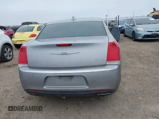2015 Chrysler 300 C with VIN 2C3CCAEG0FH779540, listed as a IAAI auction lot 41542982 with 211,348 mi miles and . Bid and sale history available at carsss.com. Image 16.