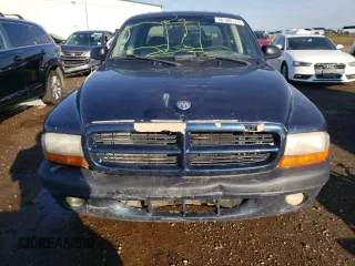 2001 Dodge Dakota Sport z VIN 1B7HL2AN51S225570, wystawiony jako Copart lot #66186174 z przebiegiem 295 142 mil mil oraz Szkoda całkowita • Salvage title. Historia ofert i sprzedaży dostępna na DreamBid. Obrazek 5.