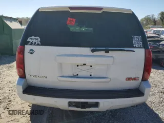 2007 GMC Yukon SLE with VIN 1GKFK13017J109923, listed as a Copart auction lot 77085954 with 214,986 mi miles and Salvage Title. Bid and sale history available at carsss.com. Image 6.