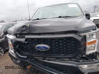 2021 Ford F-150 XL with VIN 1FTEW1EP9MKE37070, listed as a IAAI auction lot 41843951 with 69,679 mi miles and . Bid and sale history available at DreamBid. Image 12.