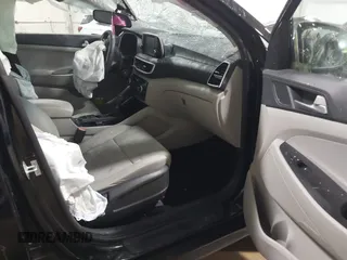 2019 Hyundai Tucson SE with VIN KM8J2CA41KU927792, listed as a IAAI auction lot 41859181 with 1 mi miles. Bid and sale history available at carsss.com. Image 5.