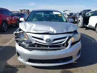 2011 Toyota Corolla L with VIN 2T1BU4EE7BC566402, listed as a IAAI auction lot 41970006 with 244,127 mi miles. Bid and sale history available at carsss.com. Image 6.