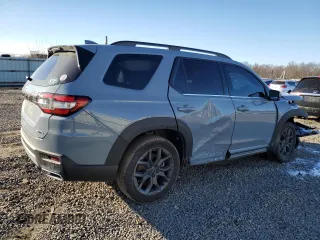 2023 Honda Pilot Elite with VIN 5FNYG1H89PB033752, listed as a Copart auction lot 86025924 with 31,547 mi miles and Salvage Title. Bid and sale history available at carsss.com. Image 3.