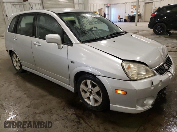 2005 Suzuki Aerio SX z VIN JS2RC61H555300879, wystawiony jako Copart lot #80481084 z przebiegiem 129 196 mil mil oraz Szkoda całkowita • Salvage title. Historia ofert i sprzedaży dostępna na DreamBid. Obrazek 4.