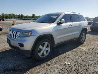 2012 Jeep Grand Cherokee Overland with VIN 1C4RJFCG5CC272580, listed as a Copart auction lot 50075735 with 209,368 mi miles and Salvage Title. Bid and sale history available at carsss.com. Image 1.