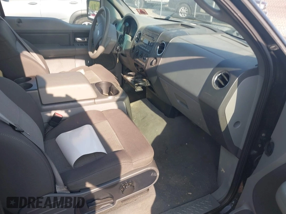 2004 Ford F-150 STX with VIN 1FTRX12W84NB75891, listed as a IAAI auction lot 42164216 with 147,934 mi miles and . Bid and sale history available at carsss.com. Image 5.