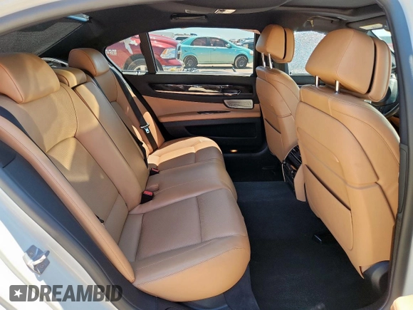 2013 BMW 7 Series 750Li с VIN WBAYE8C59DD134172, выставлен на аукционе Copart как лот 63624785 с пробегом 73 185 миль миль и Списание • Salvage title. История ставок и продаж доступна на DreamBid. Изображение 10.