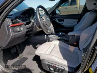2013 BMW 3 Series 335i with VIN WBA3A9G57DNP36052, listed as a Copart auction lot 50204825 with 158,102 mi miles and Salvage title. Bid and sale history available at DreamBid. Image 7.
