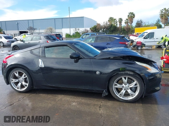 2012 Nissan 370Z Touring with VIN JN1AZ4EH4CM561303, listed as a IAAI auction lot 41788638 with 111,958 mi miles. Bid and sale history available at carsss.com. Image 13.