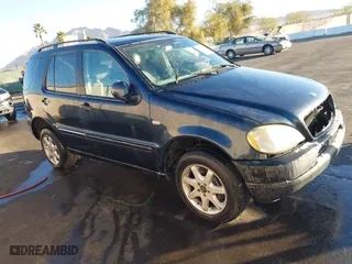 2001 Mercedes-Benz M-Class with VIN 4JGAB72E01A251463, listed as a IAAI auction lot 41392480 with 1 mi miles. Bid and sale history available at carsss.com. Image 1.