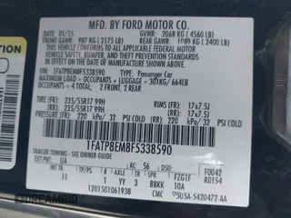 2015 Ford Mustang V6 with VIN 1FATP8EM8F5338590, listed as a IAAI auction lot 41707171 with 91,686 mi miles and . Bid and sale history available at DreamBid. Image 9.