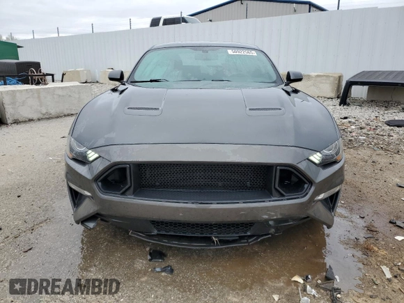 2018 Ford Mustang GT z VIN 1FA6P8CFXJ5113050, wystawiony jako Copart lot #50922565 z przebiegiem 75 609 mil mil oraz Szkody całkowita. Historia ofert i sprzedaży dostępna na DreamBid. Obrazek 5.
