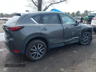 2018 Mazda CX-5 Grand Touring with VIN JM3KFBDM6J0388540, listed as a IAAI auction lot 41963726 with 103,148 mi miles. Bid and sale history available at carsss.com. Image 4.
