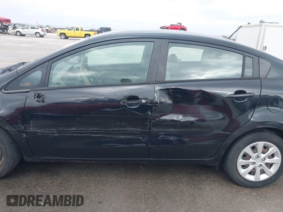 2015 Kia Rio LX with VIN KNADM4A39F6440291, listed as a IAAI auction lot 41532881 with 97,238 mi miles. Bid and sale history available at carsss.com. Image 15.