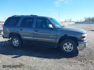 2001 Chevrolet Tahoe LS with VIN 1GNEK13T51J268816, listed as a IAAI auction lot 41654722 with 265,164 mi miles. Bid and sale history available at carsss.com. Image 13.