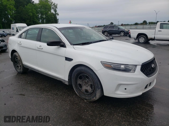 2015 Ford Police Interceptor with VIN 1FAHP2L82FG163718, listed as a Copart auction lot 56392295 with 122,940 mi miles and Salvage title. Bid and sale history available at DreamBid. Image 4.
