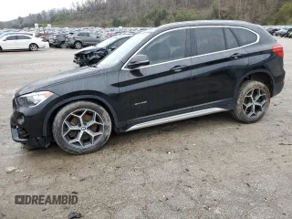 2018 BMW X1 xDrive28i with VIN WBXHT3C34J5F91817, listed as a Copart auction lot 85311514 with 123,638 mi miles and Salvage Title. Bid and sale history available at carsss.com. Image 1.