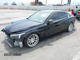 2014 Infiniti Q50 Premium z VIN JN1BV7AP3EM690571, wystawiony jako IAAI lot #42136354 z przebiegiem 191 969 mil mil oraz . Historia ofert i sprzedaży dostępna na DreamBid. Obrazek 18.