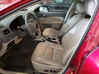 2012 Ford Fusion SEL z VIN 3FAHP0JG0CR265666, wystawiony jako Copart lot #62860355 z przebiegiem 126 812 mil mil oraz Szkoda całkowita • Salvage title. Historia ofert i sprzedaży dostępna na DreamBid. Obrazek 7.