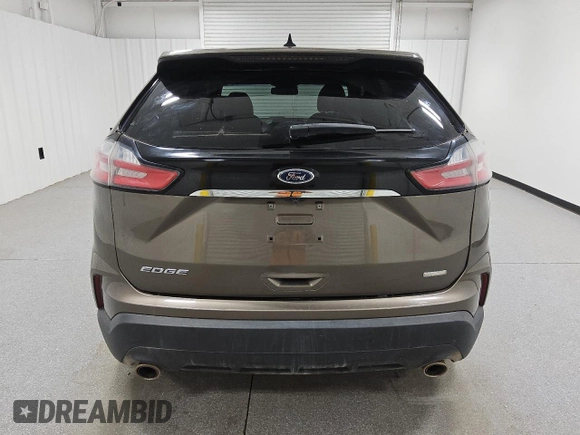 2019 Ford Edge SE с VIN 2FMPK3G93KBC51378, выставлен на аукционе Copart как лот 61231395 с пробегом 144 269 миль миль и Чистый • Clean title. История ставок и продаж доступна на DreamBid. Изображение 6.