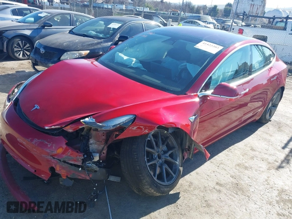 2018 Tesla Model 3 Long Range Battery z VIN 5YJ3E1EA4JF022284, wystawiony jako IAAI lot #41422203 z przebiegiem 71 521 mil mil oraz . Historia ofert i sprzedaży dostępna na DreamBid. Obrazek 19.
