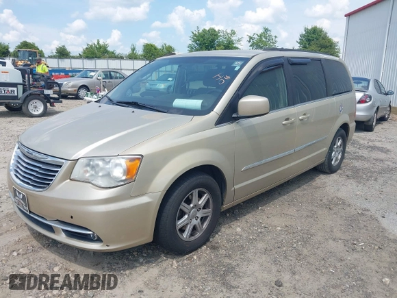 2011 Chrysler Town & Country Touring with VIN 2A4RR5DGXBR613179, listed as a IAAI auction lot 42143355 with 180,906 mi miles and . Bid and sale history available at DreamBid. Image 2.