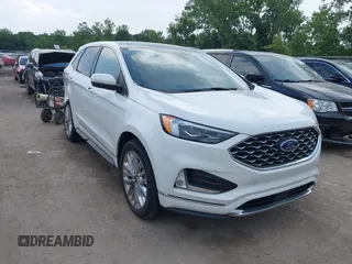 2021 Ford Edge Titanium with VIN 2FMPK4K96MBA18546, listed as a IAAI auction lot 42584326 with 65,214 mi miles and . Bid and sale history available at DreamBid. Image 1.