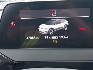 2023 Volkswagen ID.4 S z VIN 1V25MPE82PC026625, wystawiony jako IAAI lot #42256114 z przebiegiem 37 084 mil mil oraz . Historia ofert i sprzedaży dostępna na DreamBid. Obrazek 15.