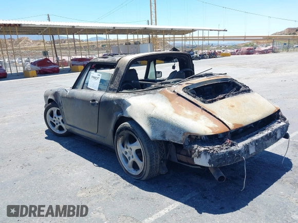 1988 Porsche 911 z VIN WP0EB0917JS161351, wystawiony jako IAAI lot #39908257 z przebiegiem Nie podano mil oraz . Historia ofert i sprzedaży dostępna na DreamBid. Obrazek 3.