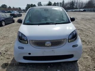 2016 Smart fortwo Passion z VIN WMEFJ5DAXGK123943, wystawiony jako Copart lot #51904865 z przebiegiem 69 821 mil mil oraz Szkody całkowita. Historia ofert i sprzedaży dostępna na DreamBid. Obrazek 5.