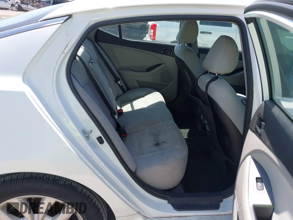 2015 Kia Optima LX with VIN 5XXGM4A76FG443962, listed as a IAAI auction lot 42069701 with 101,516 mi miles. Bid and sale history available at carsss.com. Image 8.