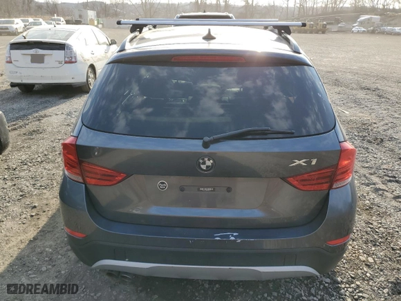 2013 BMW X1 xDrive28i with VIN WBAVL1C59DVR87374, listed as a Copart auction lot 49012675 with 217,709 mi miles and Clean Title. Bid and sale history available at carsss.com. Image 6.