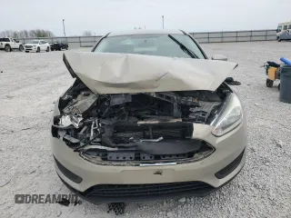 2016 Ford Focus SE z VIN 1FADP3F20GL267077, wystawiony jako Copart lot #53649665 z przebiegiem 106 329 mil mil oraz Szkoda całkowita • Salvage title. Historia ofert i sprzedaży dostępna na DreamBid. Obrazek 5.