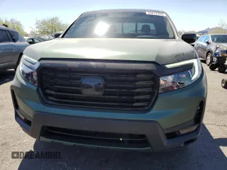 2022 Honda Ridgeline RTL-E with VIN 5FPYK3F73NB014672, listed as a Copart auction lot 54617475 with 76,160 mi miles and Salvage title. Bid and sale history available at DreamBid. Image 5.