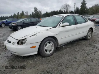 1998 Ford Taurus LX z VIN 1FAFP52U4WG195867, wystawiony jako Copart lot #51131065 z przebiegiem 132 211 mil mil oraz Szkoda całkowita • Salvage title. Historia ofert i sprzedaży dostępna na DreamBid. Obrazek 1.