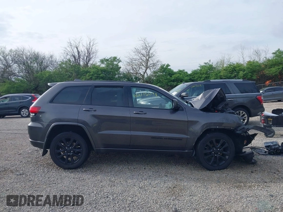 2018 Jeep Grand Cherokee Laredo E with VIN 1C4RJFAG0JC120383, listed as a IAAI auction lot 42115098 with Not Provided miles and . Bid and sale history available at DreamBid. Image 14.