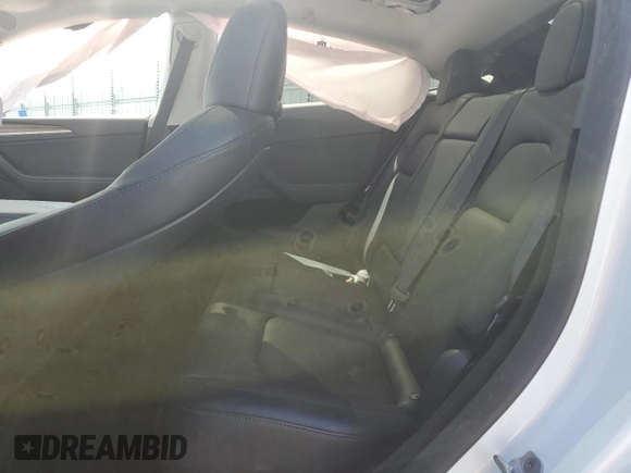 2023 Tesla Model Y Long Range z VIN 7SAYGDEE8PF816544, wystawiony jako Copart lot #57170485 z przebiegiem 74 598 mil mil oraz Szkoda całkowita • Salvage title. Historia ofert i sprzedaży dostępna na DreamBid. Obrazek 10.